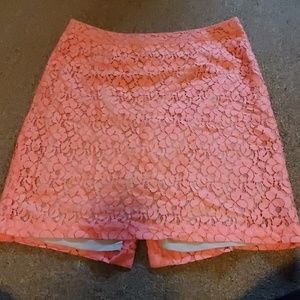 It's a coral pink size 10 shirt